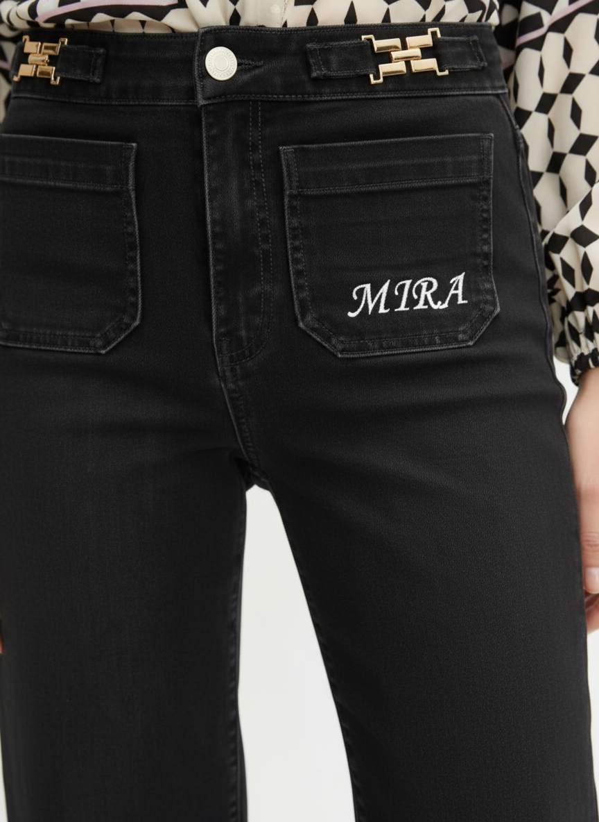 Front view of black jeans with white MIRA