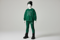 Green sweater and tights set with M logo