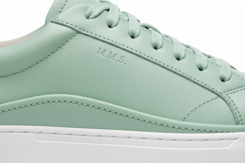 Mint green sneaker close-up