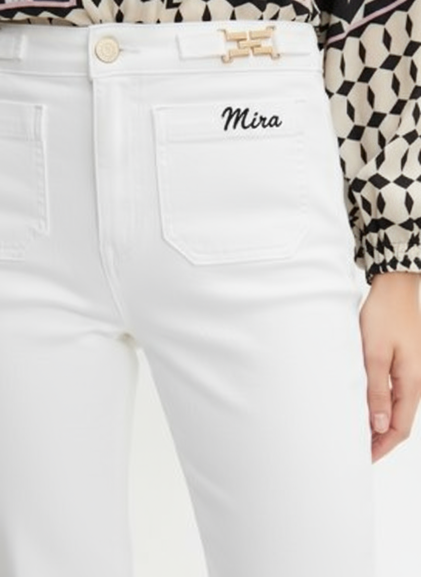 White jeans with black MIRA cursive